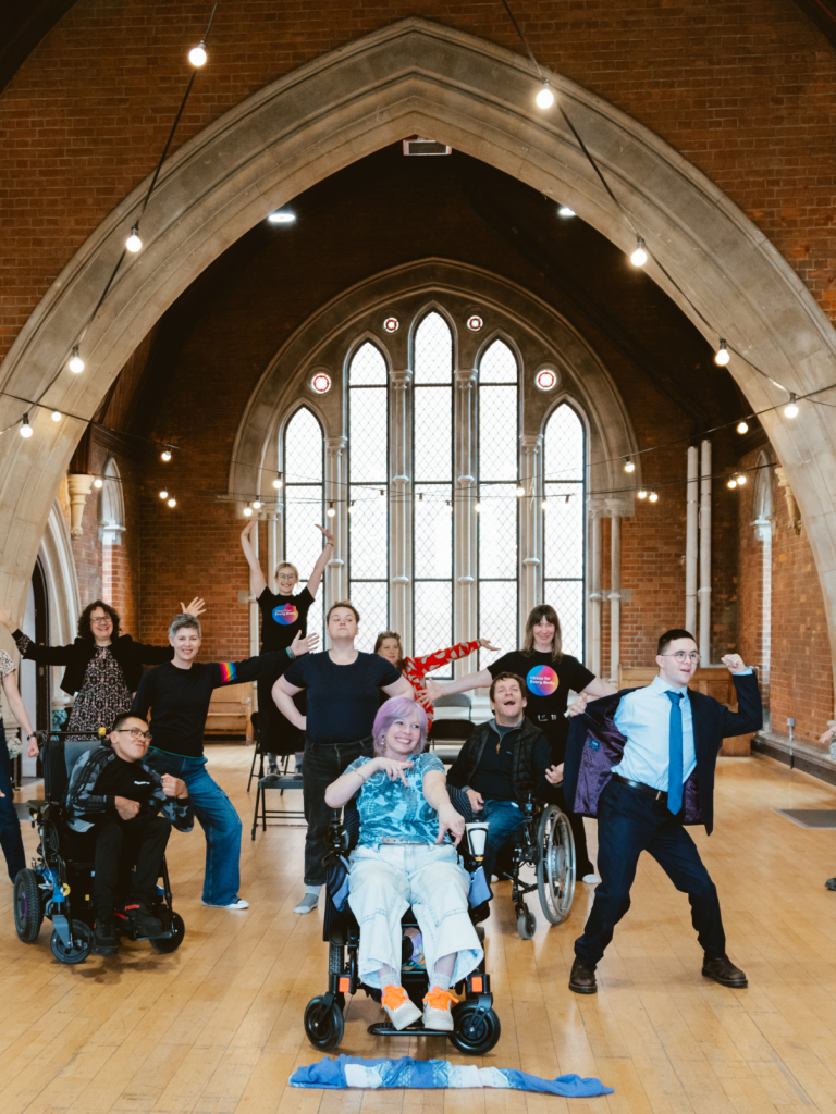 Participants of an Unexpected Leaders workshop strike a pose in the Brighton Corn Exchange.