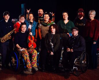 Harry Basset and others pose for a group photo while taking part in the Trailblazers Residency with Diverse City.