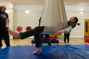 Young aerialist during a Next Generation aerial class 